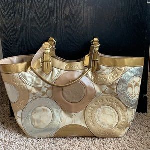Gold coach purse